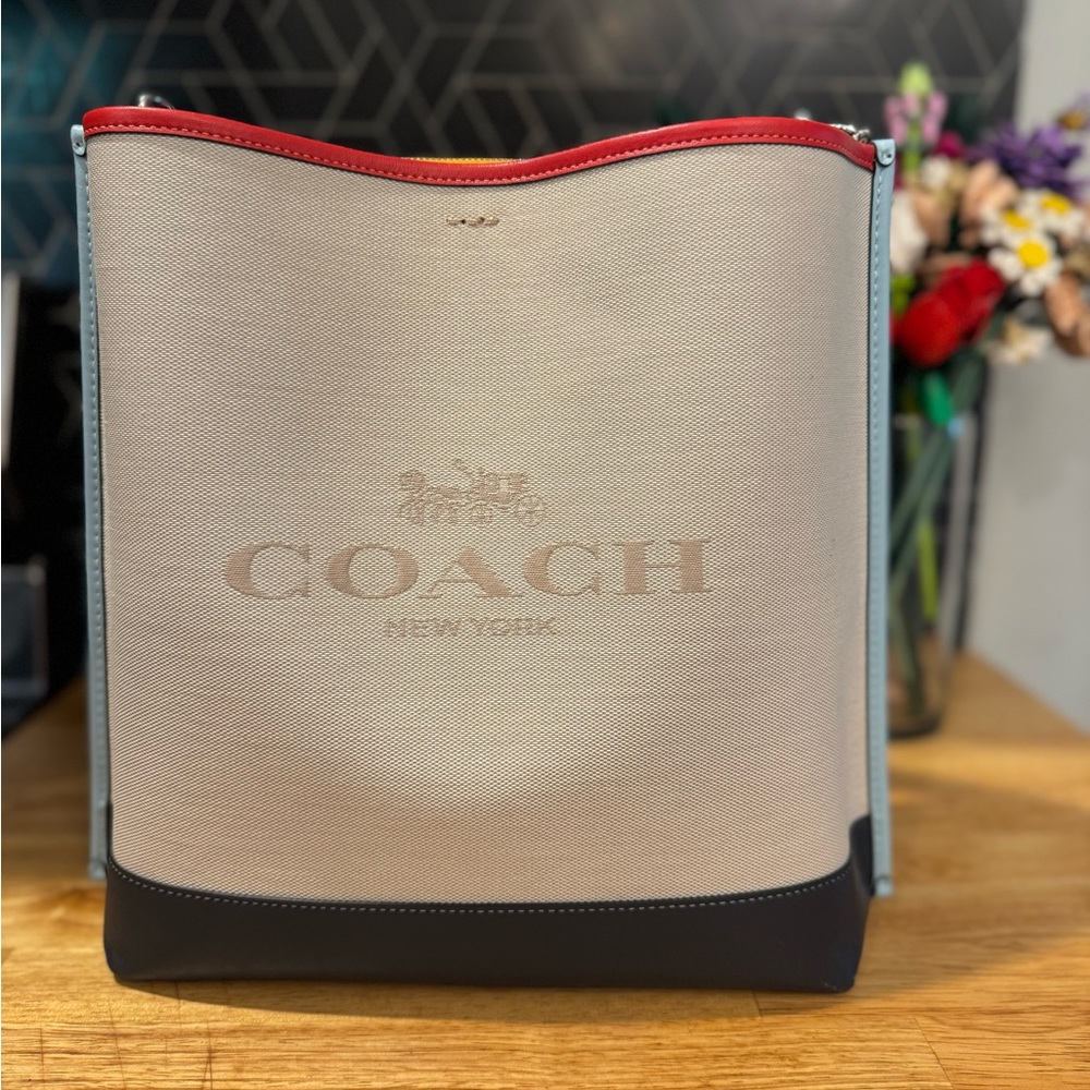 Coach Tan and Black Messenger Bag with Classic Design